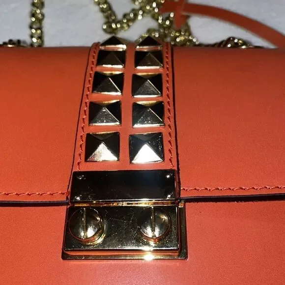 Persaman Gold/Orange crossbody bag studded